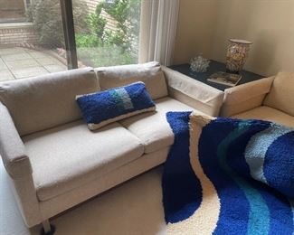 Another view of the MCM loveseat and fiber artwork