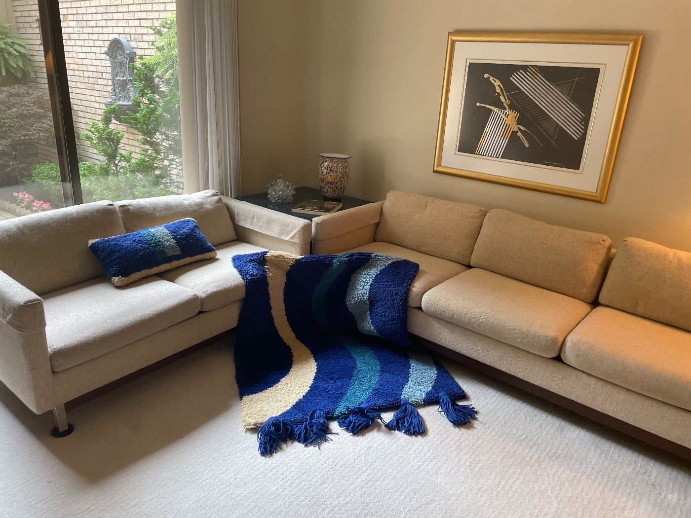 Mid-Century Modern 3-cushion couch and loveseat with chrome legs - excellent condition.  Vintage wall fiber art and pillow, mid-modern framed artwork, and more!