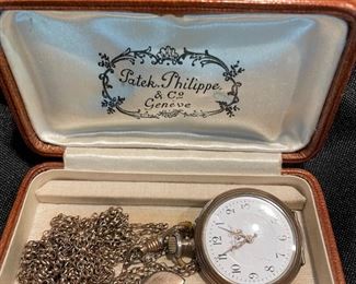 Antique pocket watch and chain and
Vintage leather Patel Philippe boxes - 2 available