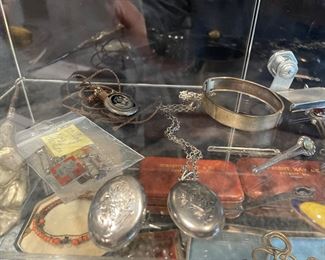 Antique and Sterling items: WWII pins, lockets, necklaces, bracelets and more