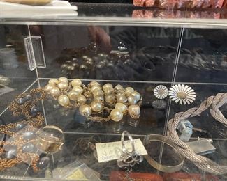 Antique necklaces, Gorge Jensen sterling pieces: moonstone ring, margarite ring, and pin