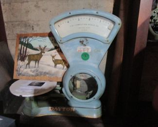 Old candy store scale with photo of it in the store it came from