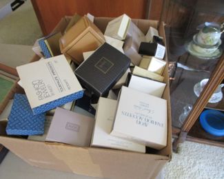 Large box of Avon jewelry still in original boxes