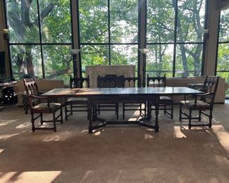 Kittinger solid walnut dining table, expands to 9.5 feet, and 6 Kittinger dining chairs.