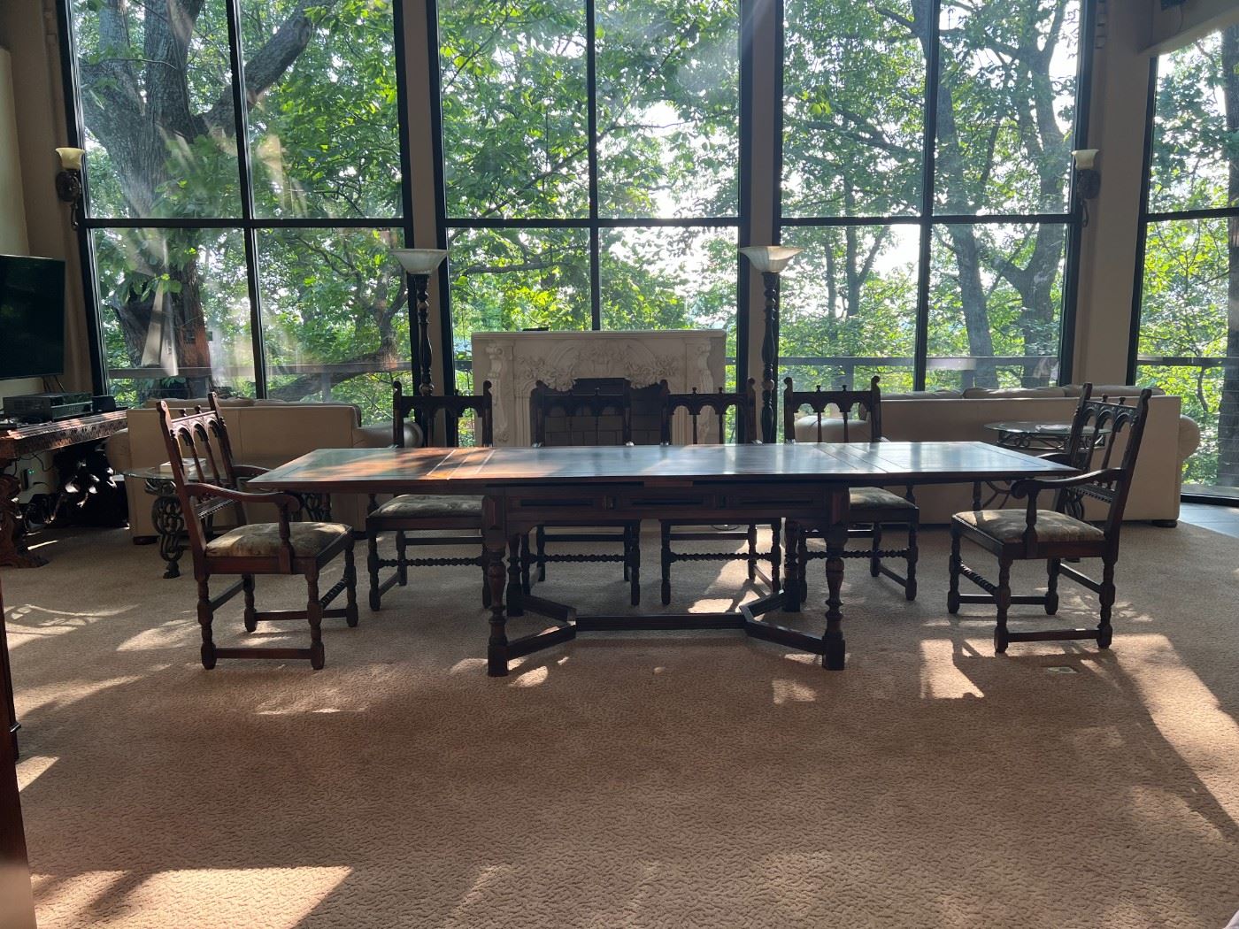 Kittinger solid walnut dining table, expands to 9.5 feet, and 6 Kittinger dining chairs.