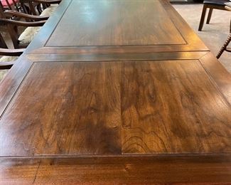 Close up of Kittinger walnut table. 