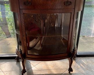 Bow front antique oak China cabinet. 