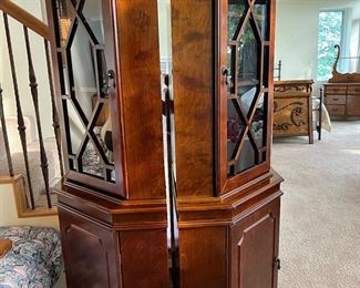 Pair of mahogany corner china cabinets. 