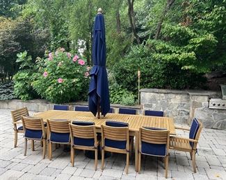 Country Casual Calypso Solid Teak Patio Table (81"/120"L x 39"W x 30-1/2"H) & Country Casual Calypso Solid Teak Stackable Chairs (10 Side Chairs, 2 Armchairs) with Extended Umbrella 