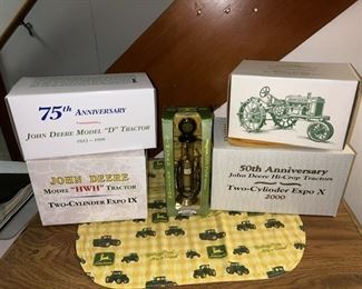 John Deere toy tractors in boxes, collectible gas pump