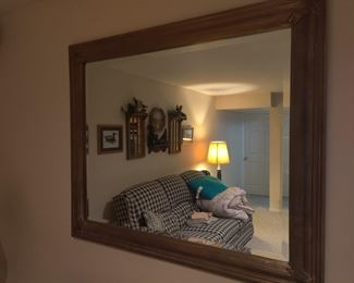 Large mirror in the basement rec room