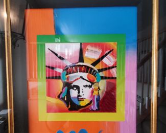 TO BID go to:          https://www.EstateSales.NET/MO/Saint-Louis/63141/marketplace/57517                                                                                                                                                                                                      Peter Max   'Liberty Head II on Blends' (American Suite) 2006 10" x 8". Hand-signed in acrylic by the artist. Mixed media with acrylic painting and color lithography on paper. This art is one of a series that Peter Max did on this theme. (certification papers)   Framed 24" x 24"