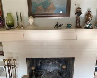 Living Room 
Lighthouse painting 
Glass vases 
Stone bust
Brass candlesticks 