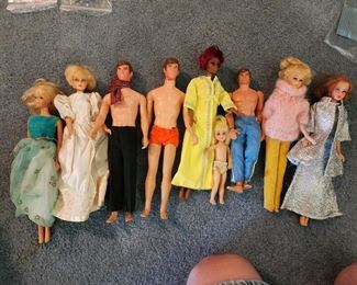 Barbies and Ken dolls from the 60's.
