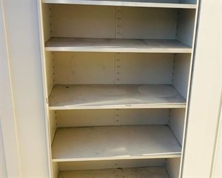 Inside metal storage cabinet