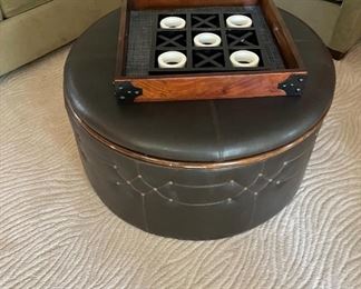 Storage ottoman; tic-tac-toe game