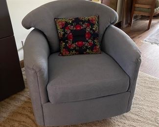 One of the pair of blue swivel rockers