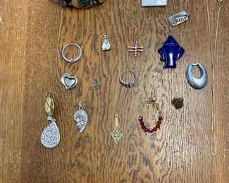 Assorted Earrings Pendants Rings And Necklaces