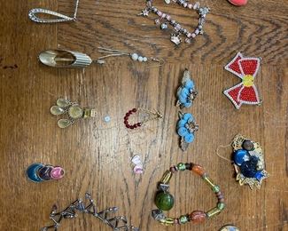 Collection Of Broaches Earrings Pendants And More