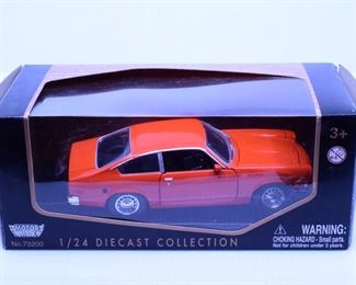 Lot 001-MT: 1974 Vega Die-cast

Features:
•	Item no. 73200

Manufacturer: Motor Max
Mfg. Year: N/A
Scale: 1:24
Country of Origin: China
Color: Orange
Material: Diecast Metal with some plastic parts
Condition: Very Good Pre-owned; Box – has been opened.
