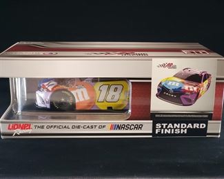 Lot 008-MT: Kyle Busch Die-cast 2021 Camry M&M's Fudge Brownie

Features:
•	NASCAR Cup Series
•	Standard Finish
•	1 of 552 made
•	Box imprinted "21021EL"       
 
Manufacturer: Lionel Racing
Mfg. Year: 2021
Scale: 1:24
Country of Origin: China, hand crafted
