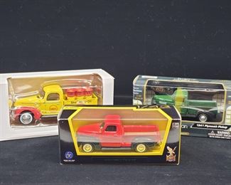 Lot 013-MT: Die-cast Pickup Trio #1

Features:
•	1 – Lucky Diecast 1950 GMC Pick Up
•	1 – Motor Max Diecast 1941 Plymouth Pickup
•	1 – Shell Ford Pickup with Oil Drums, No. 9520

