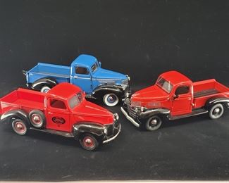 Lot 027-MT: Die-cast Pickups of the 40s

Features:
•	Diecast 1940 Ford Sales and Service Pickup
•	Diecast 1941 Chevrolet Pickup
•	Diecast 1941 Dodge Pickup
