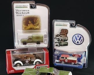 Lot 031-MT: Die-cast Volks and Chevys

Features:
•	Diecast 1959 U.S. Army Military Police Chevrolet Impala, no. 35920
•	Diecast 1967 VW Classical Beetle Police, no. 5057WP
•	Diecast 1968 Volkswagen Type 2 Double Cab Pickup with 1920 Indian Scout Motorcyle, #36030-A
•	Diecast Norman Rockwell Series 4 1984 Chevrolet M1008, #54060-F

