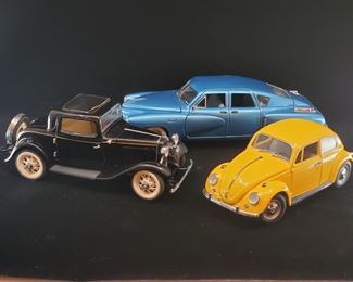 Lot 038-MT: Franklin Mint Die-cast Trio

Features:
•	Franklin Mint Diecast 1967 Volkswagen Beetle
•	Franklin Mint Diecast 1932 Ford Deuce Coupe
•	Franklin Mint Diecast 1948 Tucker
