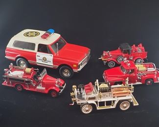 Lot 039-MT: Four Matchbox Fire Engines and a Die-cast “Blazer”

Features:
•	Diecast U.S. Marshal 1969 Chevrolet Blazer, no. 0889GD
•	Mattel Matchbox Models of Yesteryear – 1907 Seagrave AC53 V.F.D, no. YFE21
•	Matchbox Models of Yesteryear – 1930 Model “A” Ford Van F.D.N.Y, no. YFE12
•	Matchbox Models of Yesteryear – 1935 Mack Pumper, no. YFE15
•	Matchbox Models of Yesteryear – 1953 Ford F-100 Fire Truck Garden City F.D., no. YFE14


