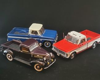Lot 041-MT: A Trio of Die-cast Chevy Pickups

Features:
•	Danbury Mint Diecast 1937 Chevrolet Pickup
•	Danbury Mint Diecast 1966 Chevrolet C10 Pickup
•	Danbury Mint Diecast 1972 Chevrolet Cheyenne Pickup

