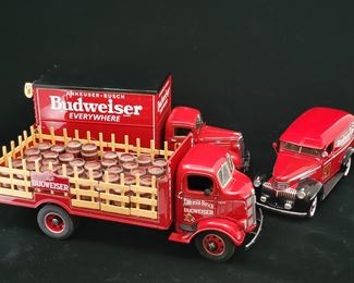 Lot 046-MT: Budweiser Die-cast Delivery Truck Trio #1

Features:
•	Diecast 1937 Chevrolet Anheuser-Busch Budweiser Delivery Truck with Wooden Barrels
•	Diecast 1938 Budweiser Delivery Stake Truck with Wooden Barrels
•	Diecast 1941 Chevrolet Budweiser Delivery with Product Boxes



