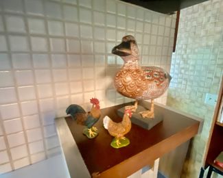 Duck and rooster figures