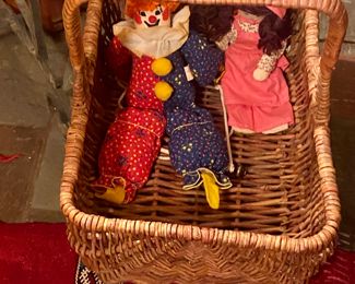 Basket of dolls and clown