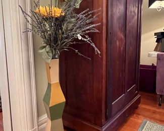 Colorful art, vase, and arrangement