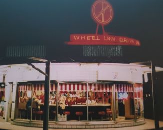 Image of Neon Wheel on original building in Sedalia, Mo