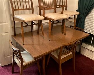 BEAUTIFUL MID-CENTURY BY HOLMAN MANUFACTURING DINING TABLE AND CHAIRS ABSOLUTELY AWESOME. WE HAVE LOTS MORE MID-CENTURY BY HOLMAN.