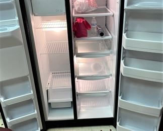 GE SIDE BY SIDE BLACK REFRIGERATOR FREEZER.