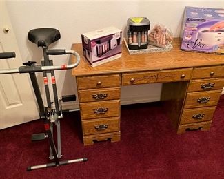 VINTAGE DESK AND EXCERCISE BIKE.
