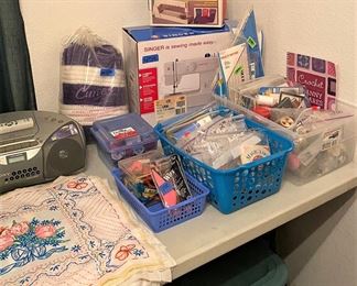 SEWING NOTIONS. PORTABLE SEWING MACHINE, SONY PORTABLE STEREO W/REMOTE AND MORE.