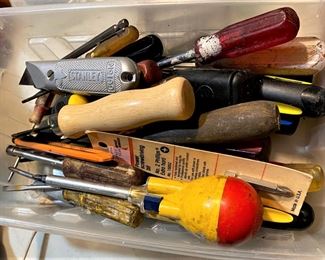 LOTS OF SCREWDRIVERS.