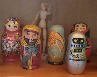 7 Nesting Dolls And Figurine