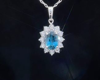 London Blue Topaz & Diamond Miracle Oval Halo Cluster Pendant Necklace in White Gold