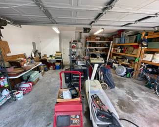Garage is full of tools and some fishing gear, assortment of LP's ( no classic rock) and other misc items. 