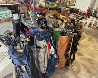 6 Golf bags full of various clubs 
