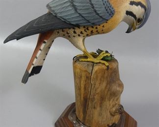 Kakarise carved hawk and insect