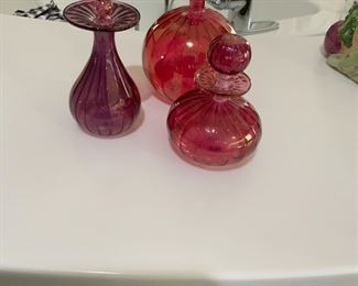 3-bottle set of rose-colored perfume bottles.  Small $14  Tall $15 Larger $18 (all 3 for $37)