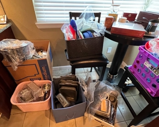 Bar table and two chairs and other kitchen