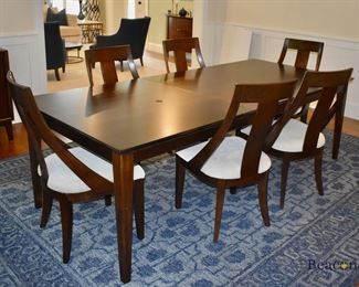 Casana dining table with eight chairs
