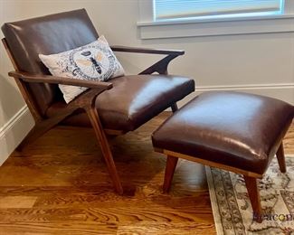 Cavett Leather wood frame accent chair and ottoman from Crate & Barrel